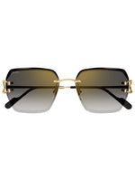 A frontal view of a folded pair of Cartier sunglasses with a gold, slanted square frame and gradient lenses against a white background. The brand name "Cartier" is visible on the right left lens.