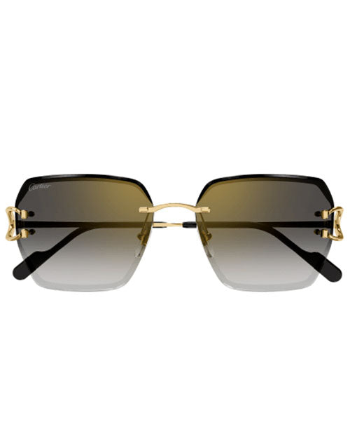 A frontal view of a folded pair of Cartier sunglasses with a gold, slanted square frame and gradient lenses against a white background. The brand name "Cartier" is visible on the right left lens.
