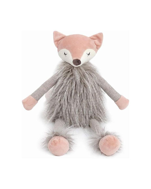 A plush toy resembling a fox with closed eyes, grey fur around the body, and legs placed out in front of it. The fox is sitting in front of a white background.