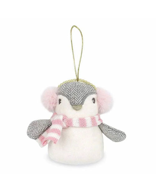 A plush penguin ornament with a gray herringbone pattern and a white belly, pink earmuffs, and a pink-and-white striped scarf. A gold loop is attached to the top of its head for hanging, with a matching-colored nose. The background is plain white.
