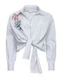 Striped shirt with floral embroidery on a white background