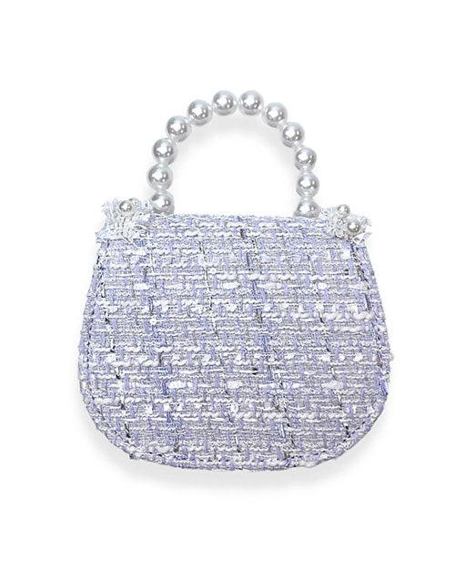 A stylish purple purse embellished with pearls and beads, reflecting a sophisticated aesthetic.