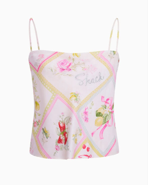 A pink and yellow floral print top, featuring vibrant colors and a stylish design.

