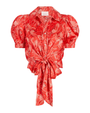 Red patterned blouse with puff sleeves on a white background