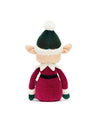 Back view of a plush elf toy wearing a green hat with a white pom-pom, red outfit with white cuffs and collar, and a black belt, with large ears visible on the sides of its head.