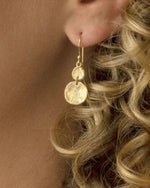 Model wearing Double Hammered Disc Earring.
