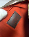 Louis Vuitton inside tag in brown "made in Spain" and red interior.