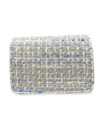 Back view of the little girls blue tweed purse