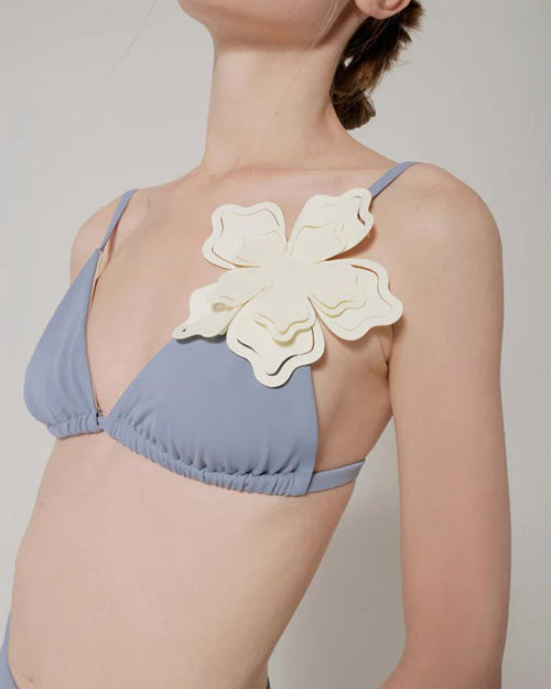 Model showing front of bikini top.