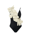 Black one-piece swimsuit with white floral decorations sewn like a sash.