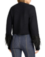 Back view of a black cropped cardigan with feather-trim cuffs, shown on a plain background.
