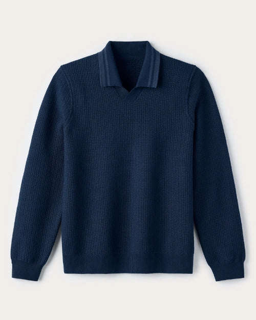 Men's navy blue textured knit long-sleeve polo sweater with ribbed collar, cuffs, and hem displayed on a light gray background.