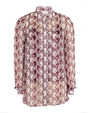 A stylish women's shirt adorned with a checkered pattern, perfect for casual wear.