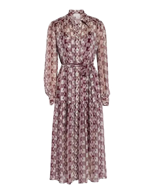 A dress made from a patterned fabric featuring intricate designs and vibrant burgundy and white colors. 