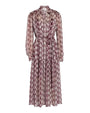 A dress made from a patterned fabric featuring intricate designs and vibrant burgundy and white colors. 