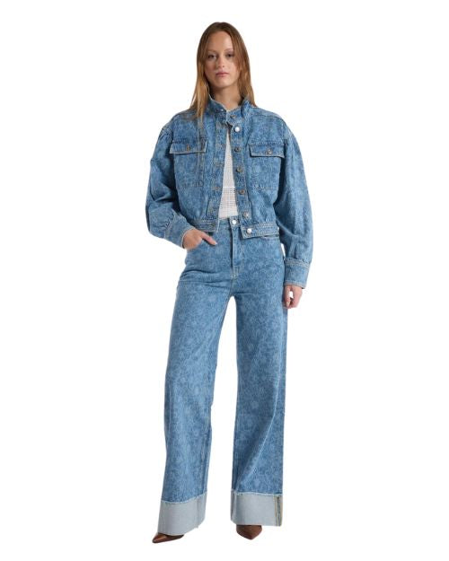 A denim jacket paired with wide-leg pants, showcasing a casual and stylish outfit combination.
