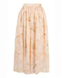 A long skirt adorned with a whimsical horse print on the fabric.