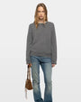 Gray crew neck sweater with silver embellished shoulder details