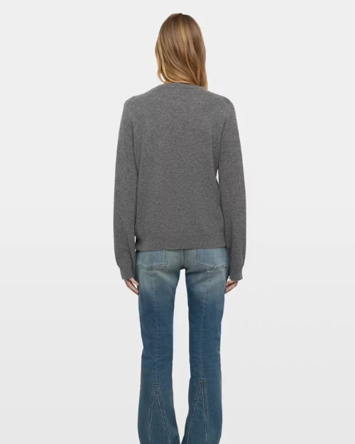 Back view of gray crew neck knit sweater with long sleeves