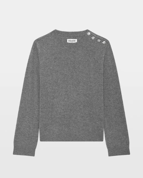 Gray crew neck knit sweater with silver star embellishments on shoulder