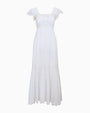 White maxi dress with flutter sleeves, a square neckline, button-front detail, fitted empire waist, and a flowing tiered skirt on a white background.