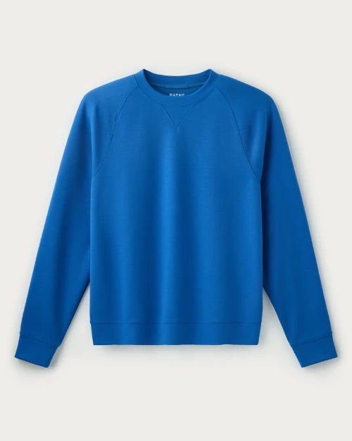 Royal blue crewneck sweatshirt with raglan sleeves and ribbed cuffs shown on a white background