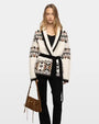 Ivory Fair Isle knit cardigan with black tie belt and geometric pattern