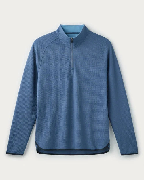 Blue textured quarter-zip performance pullover with long sleeves, mock neck collar, and lightweight athletic design displayed on a light gray background.