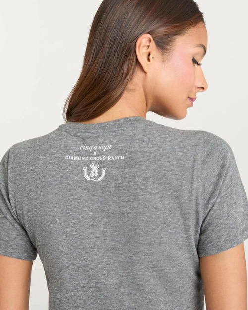 Back view of a gray T-shirt with small logo text at the upper back, shown on a plain background.