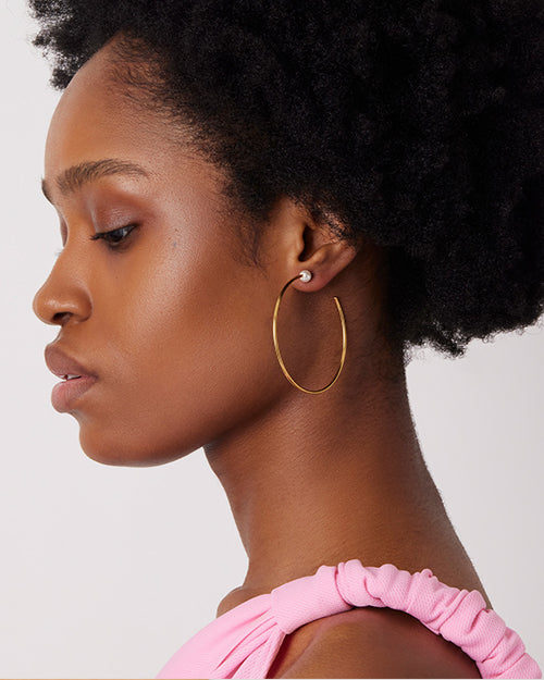 Model's side of face showing hoop.