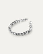 A silver twisty braided bracelet with the clasp open 
