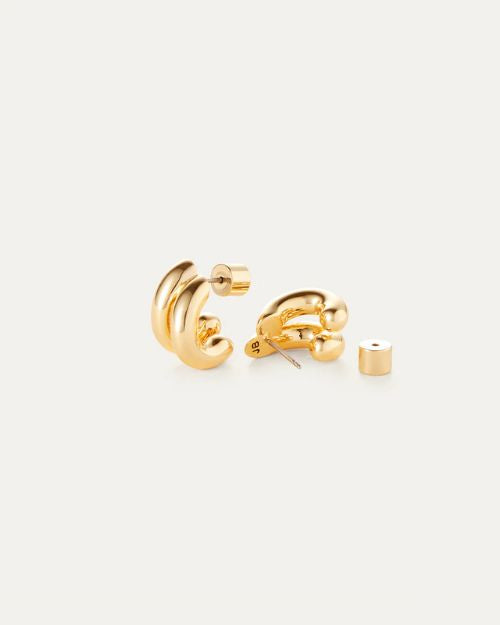 Image of mini double stacked gold hoop earrings.
