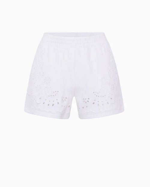 White shorts with an elastic waistband and eyelet-style cutout detailing along the hem.
