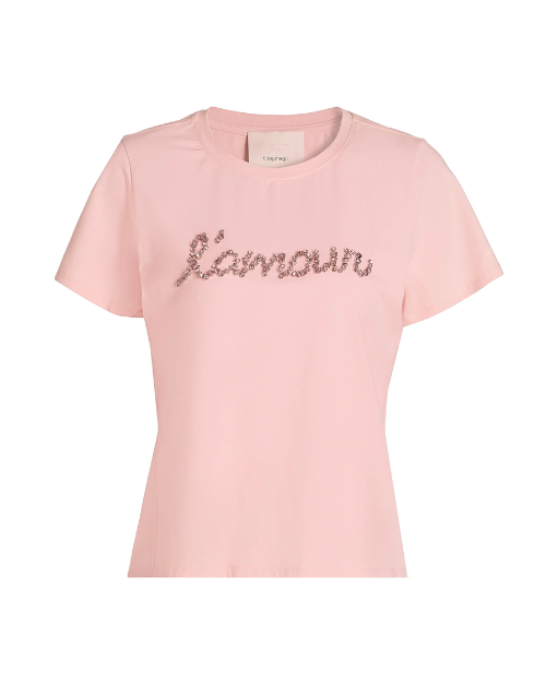 A light pink graphic T-shirt on a plain background.