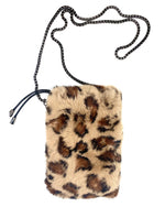 A faux fur crossbody bag with a leopard print design, featuring a black and silver chain strap and black zipper tassels. The bag has a rectangular shape with a fluffy texture, predominantly in shades of brown and black.