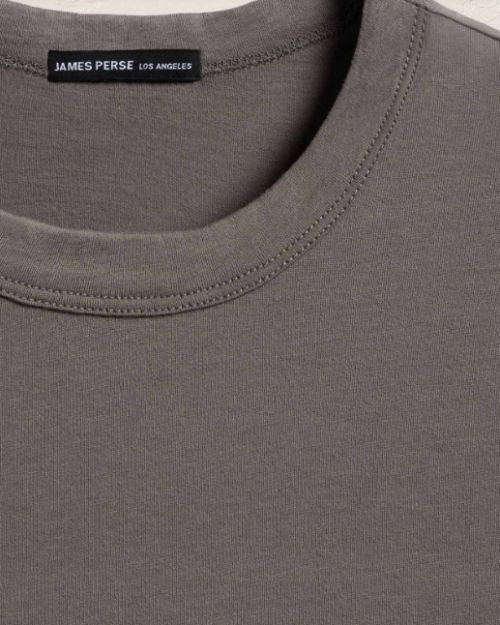 Up-close image of a brushed lotus crew short sleeved shirt. 