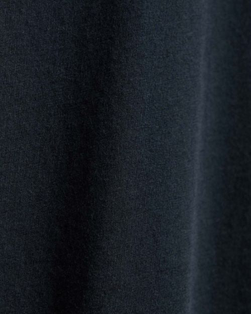  Detailed view of a long sleeve crew shirt, French Navy Elevated Lotus Jersey.