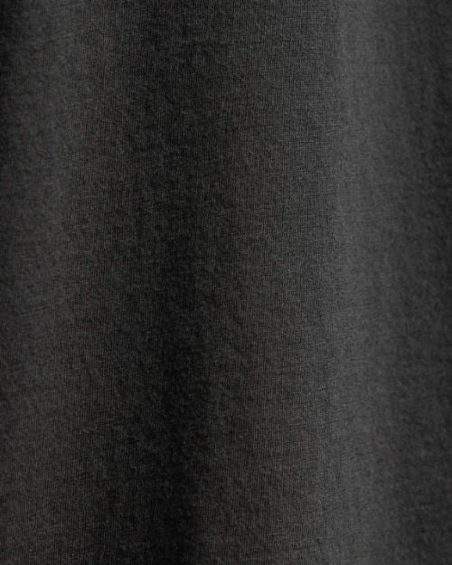 Close-up of a Carbon Elevated Lotus Jersey long sleeve crew shirt against a white background.