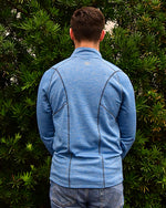 Back of pullover that shows visible stitching.