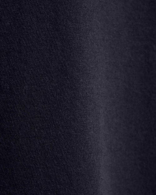 Close-up of along sleeve crew neck shirt, showcasing its soft texture and clean design.