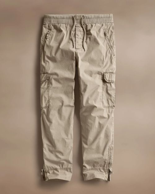 Parachute Poplin Cargo pants displayed, featuring multiple pockets and a relaxed fit for comfort and utility.