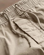 Parachute Poplin Cargo pants with a drawstring waist, designed for comfort and casual wear.