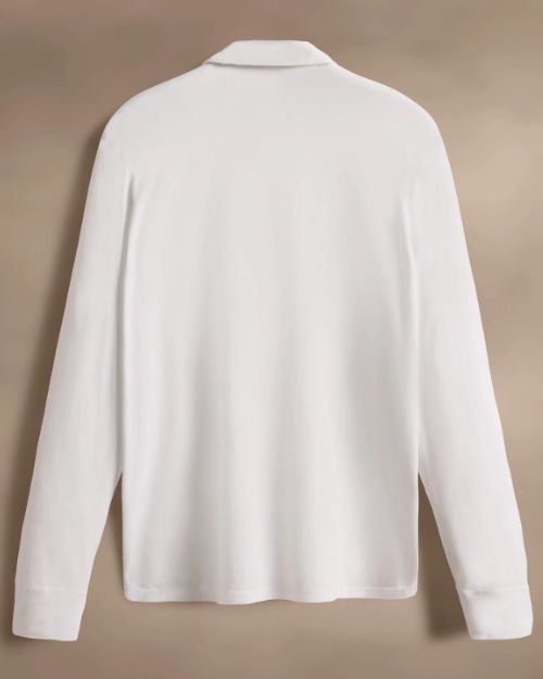 A 100% white cotton jersey rugby shirt displayed against a neutral background.