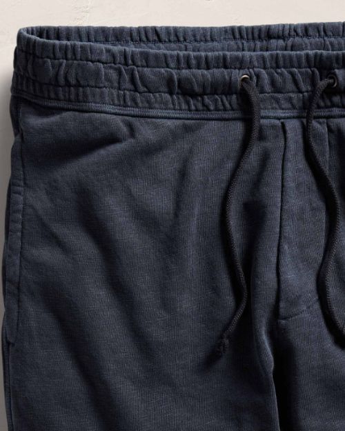 A pair of vintage French Terry sweatpants in dark blue with an adjustable drawstring.