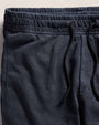 A pair of vintage French Terry sweatpants in dark blue with an adjustable drawstring.