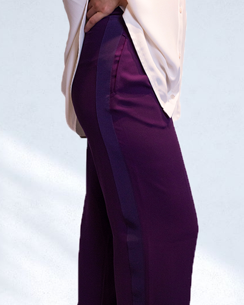 Side view of Silk Crepe Trousers in purple, highlighting the side stripe in a different purple.
