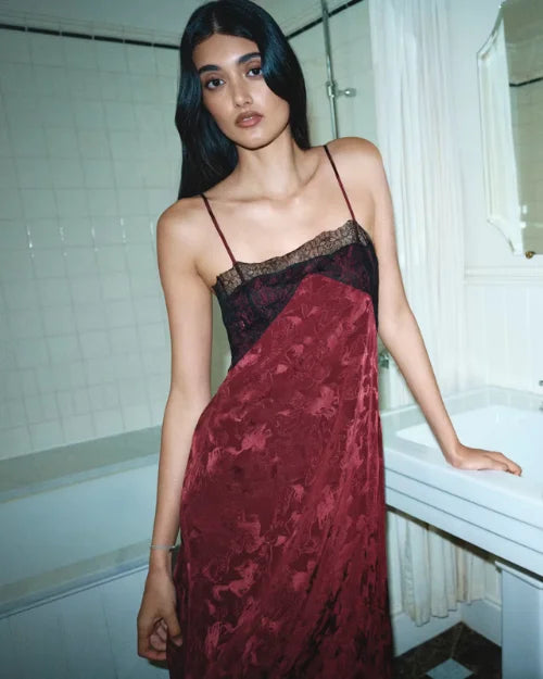 Burgundy jacquard midi slip dress with black lace trim and spaghetti straps