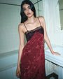 Burgundy jacquard midi slip dress with black lace trim and spaghetti straps