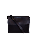 Black messenger bag with a flap and shoulder strap.