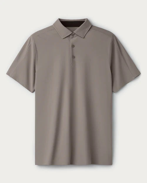 Light taupe short-sleeve polo shirt with a three-button placket and classic collar, displayed on a clean neutral background.